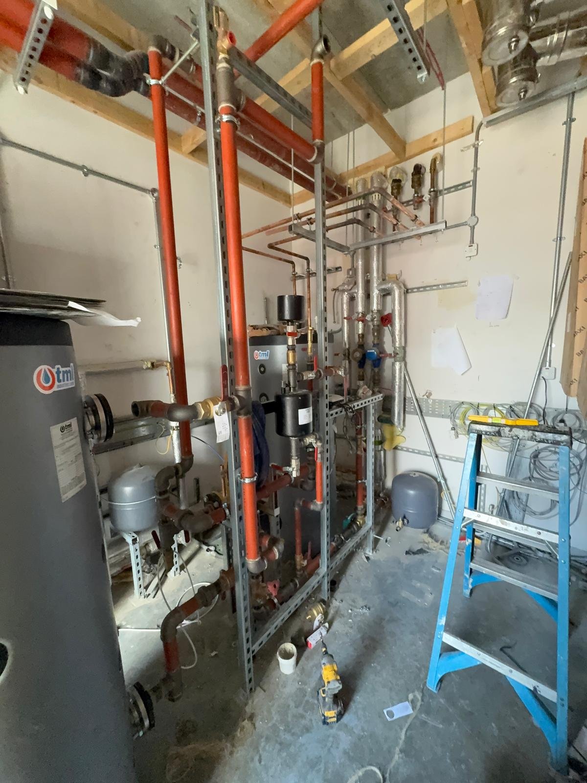 Plant room pipework installation in progress