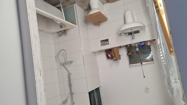 Bathroom refit with basin and tiled walls