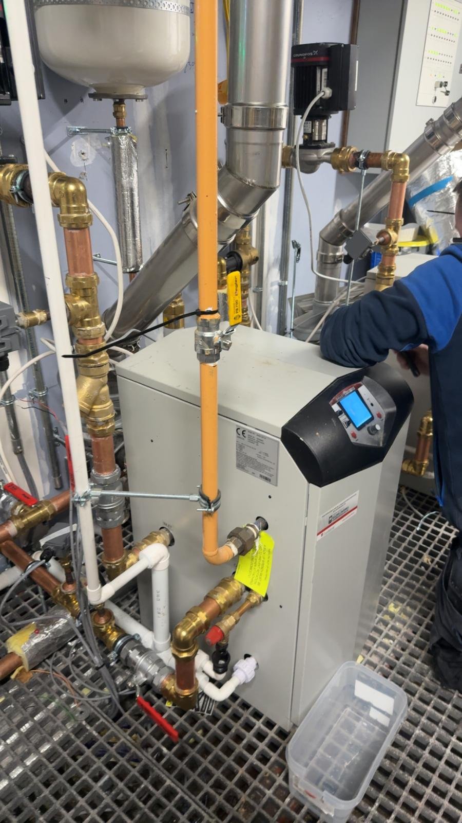 Boiler and pump assembly with copper and brass pipework